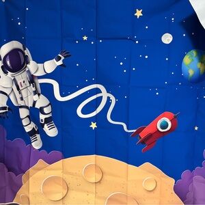 Space-Themed Picture backdrop approximately 5’ by 4’